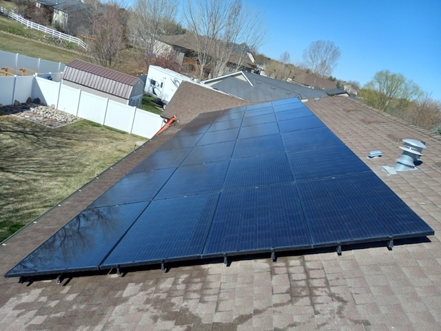 clean solar panels on a roof